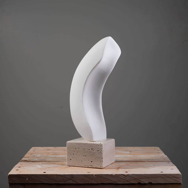 Banana-shaped marble sculpture by FP Art
