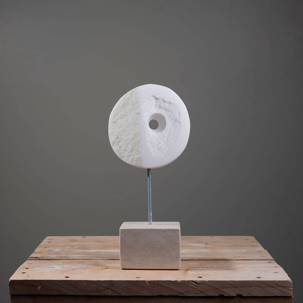 Circular marble sculpture by FP Art